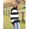 image:imageZeagoo Womens Turtleneck Sweater 2026 Fall Winter Chunky Knitted Pullover High Low Hem Trendy Basic Jumper TopBlack Stripe